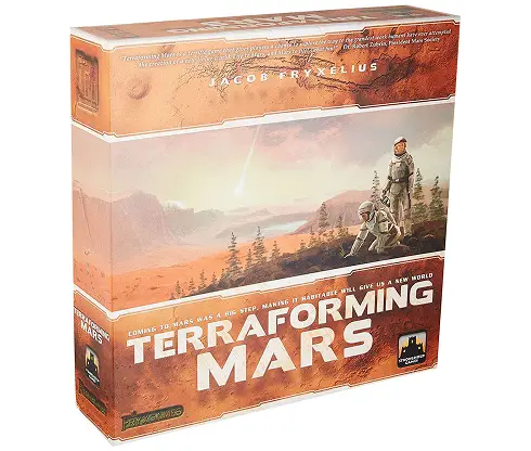 Pudełko gry planszowej Terraforming Mars z astronautami i krajobrazem Marsa, gra strategiczna science fiction o kolonizacji Marsa.